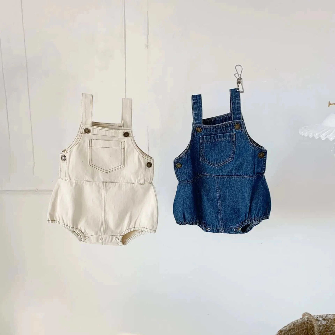 Denim Baby OverallsIndulge in undeniable cuteness with our denim overalls and matching t-shirts, thoughtfully crafted from 95% cotton. These versatile pieces are an absolute must-have KORSH KORSH Denim Baby Overalls